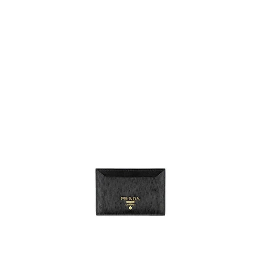 Black textured leather card holder with gold logo detailing on white background
