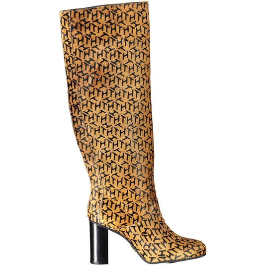Tan knee-high leather boot with black geometric pattern and block heel