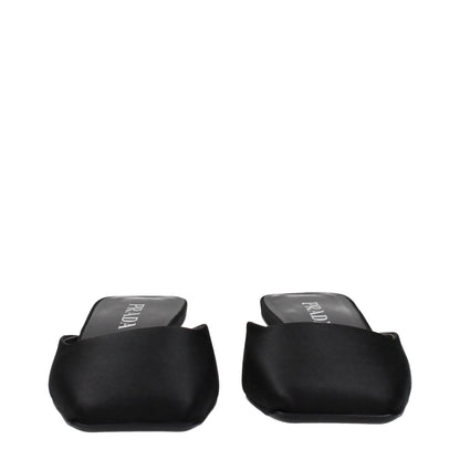 Black satin square-toe slip-on mule sandals with low heels on white background